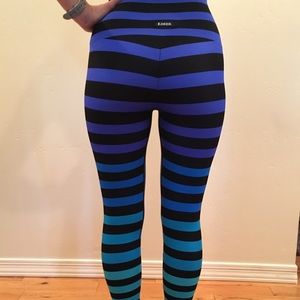 K-Deer striped yoga pants, completely opaque.